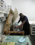 Jacky Tsila is the editioning printer at The Artists' Press.