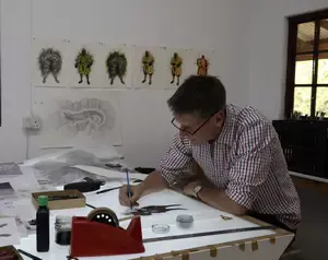 Letterpress prints and lithographs By Walter Oltmann who also does monumental sculptures made out of wire.