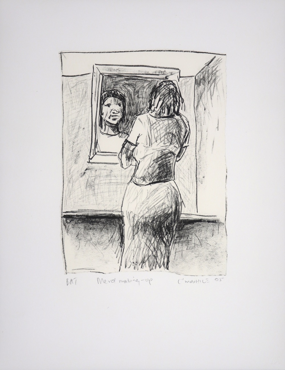 Woman seen from the back looking at her face in a mirror