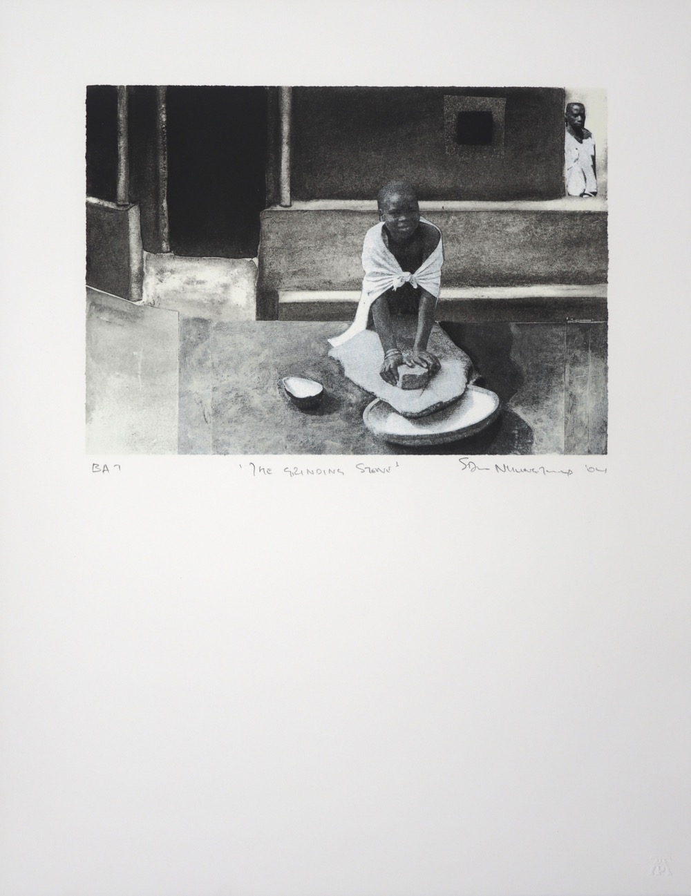 Young woman kneeling on the ground using a grinding stone in traditional homestead yard