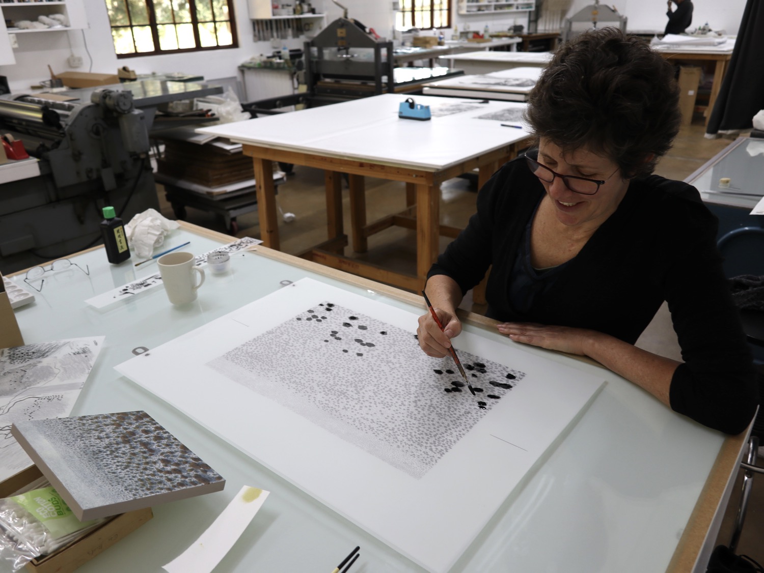 Artist Karin Daymond working on a colour separation for one of her Kalahari lithographs