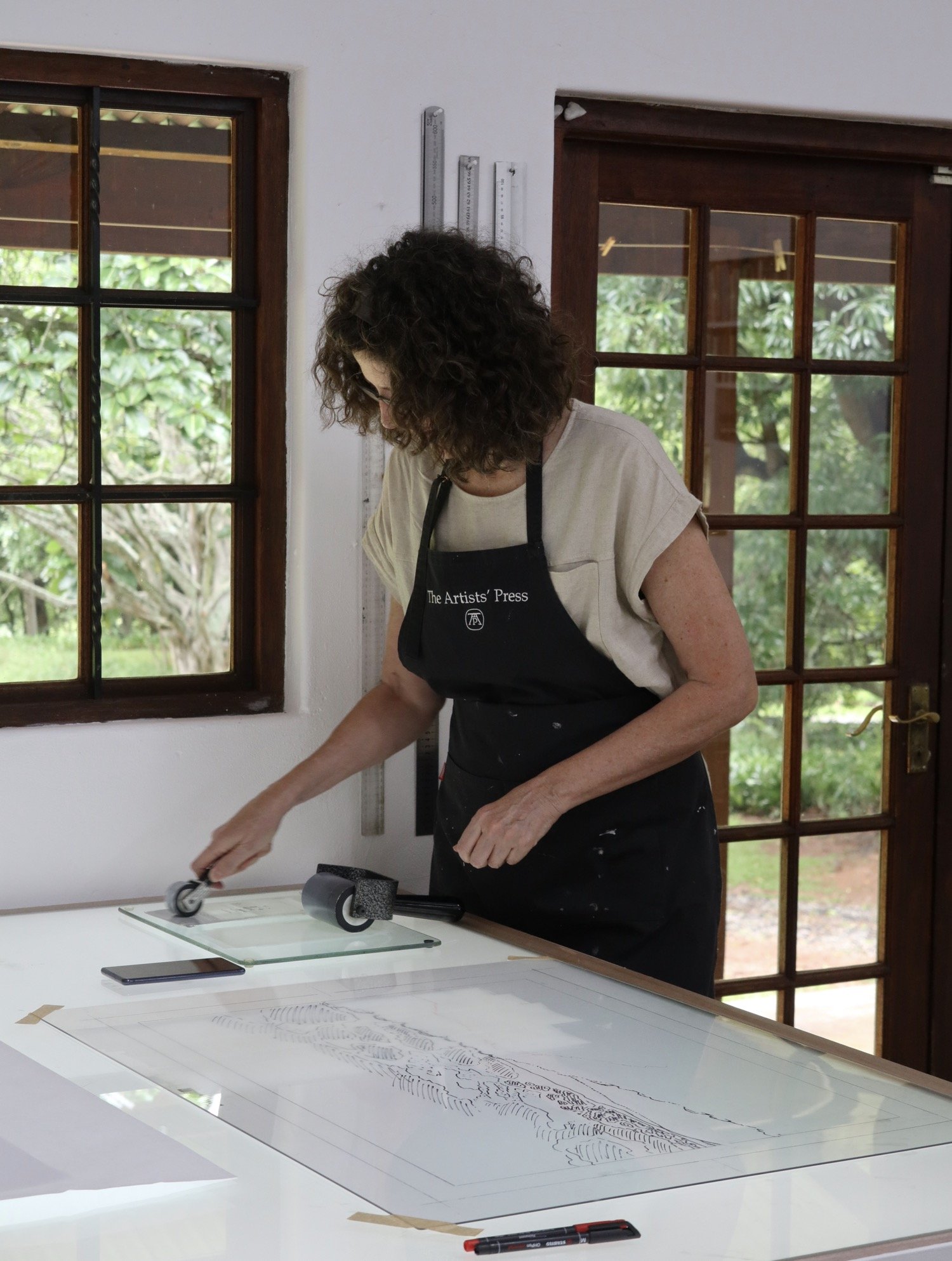 Karin Daymond working on a monotype at The Artists' Press