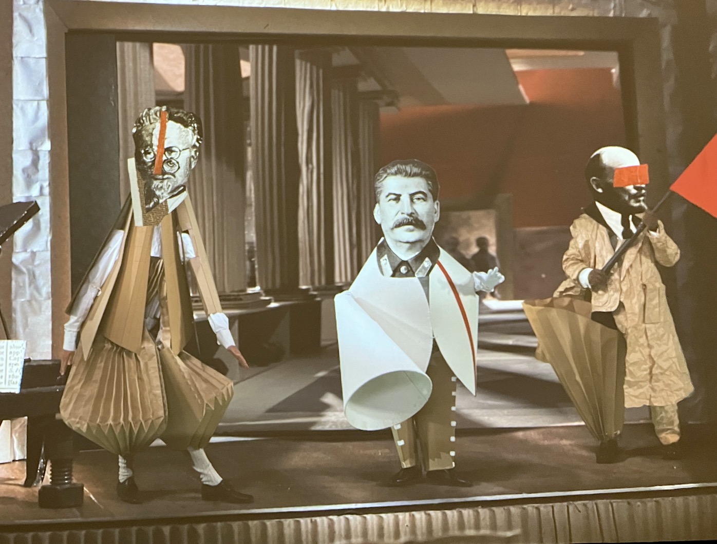Film still from Oh to Believe in Another World by William Kentridge featuring Trotsky, Lenin and Stalin